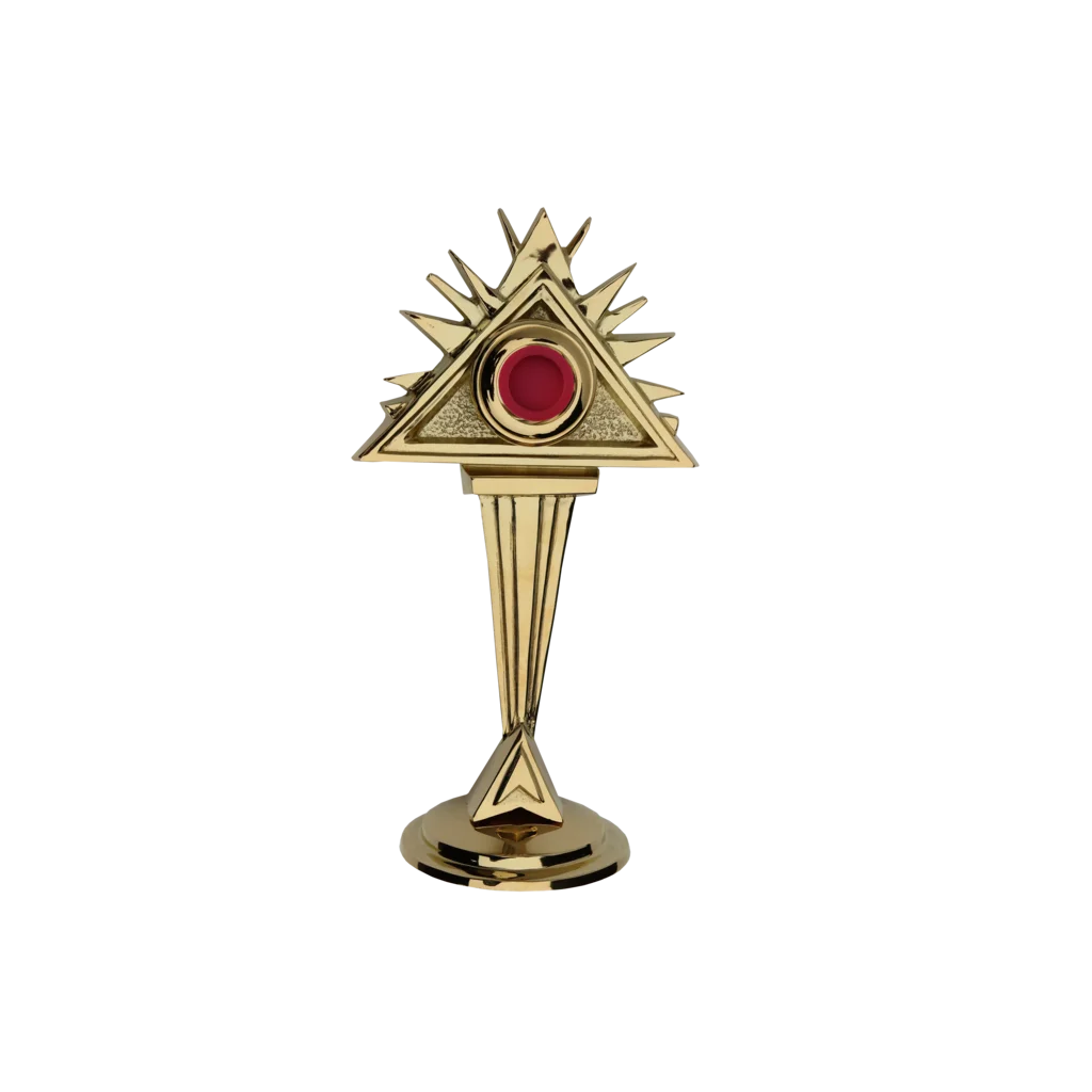 Relikwiarz w kształcie trójkąta symbolizującego Trójcę Świętą, złocony z promienistymi zdobieniami.