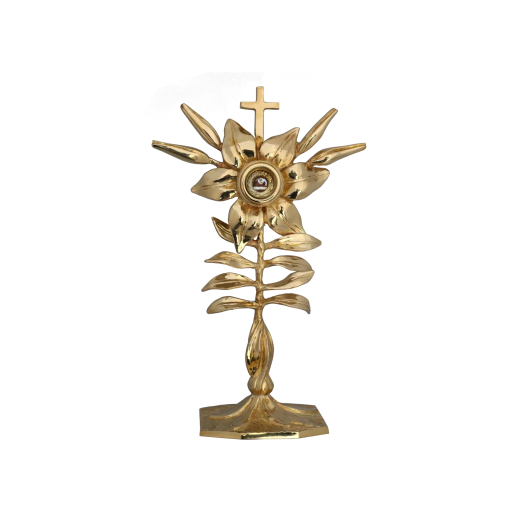 „Relikwiarz bł. Karoliny Kózkówny w kształcie złotej lilii – symbolu czystości i męczeństwa.”