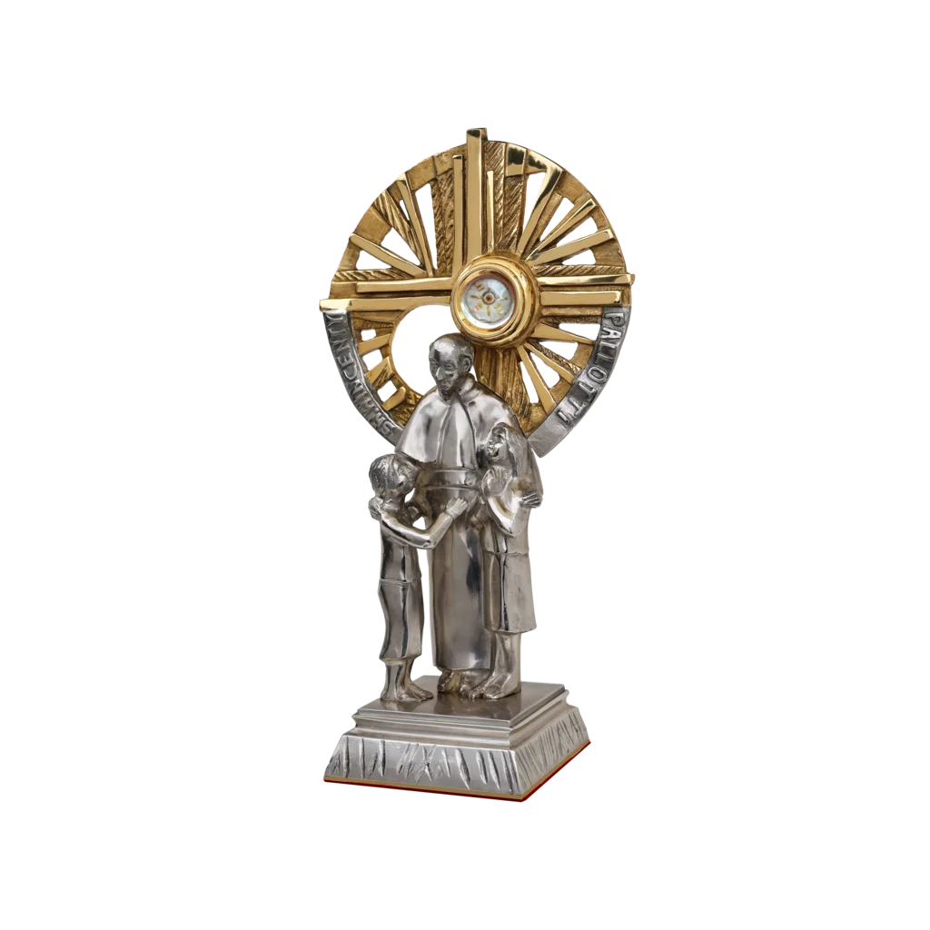 „Relikwiarz św. Wincentego Pallottiego – złoty krzyż z promieniami i postać świętego obejmującego dzieci”