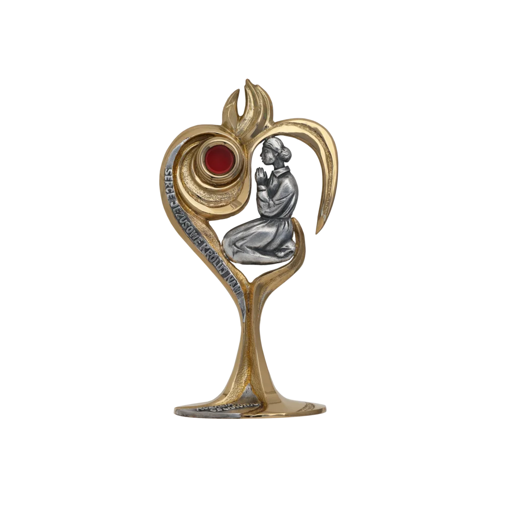 Relikwiarz bł. Rozalii Celakówny – złote serce z płomieniami i postacią w modlitwie, symbol oddania Sercu Jezusowemu.